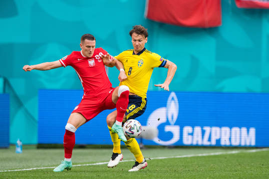 Piotr Zielinski of Poland and Albin Ekdal of Sweden