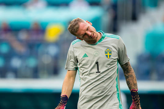 Goalkeeper Robin Olsen of Sweden in pain