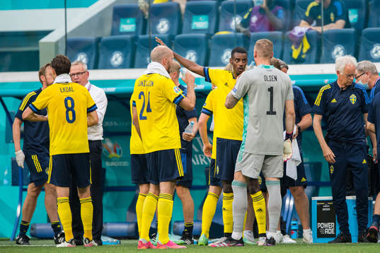 Alexander Isak and goalkeeper Robin Olsen of Sweden