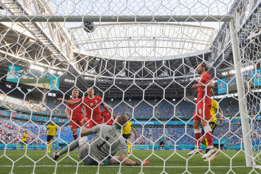 Robert Lewandowski of Poland with a header in the crossbar