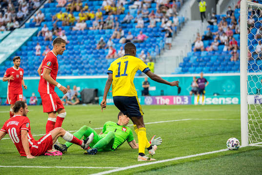 Alexander Isak of Sweden against Grzegorz Krychowiak and