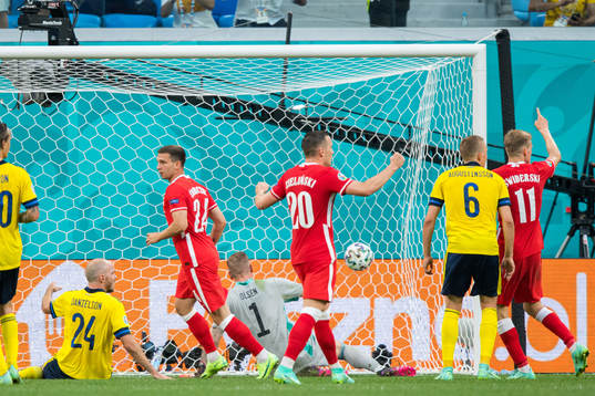 Jakub Swierczok of Poland scores 2-2 with is disallowed by