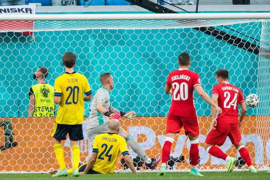 Jakub Swierczok of Poland scores 2-2 with is disallowed by