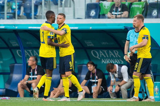 Marcus Berg change with Alexander Isak of Sweden