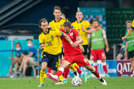 Grzegorz Krychowiak of Poland and Kristoffer Olsson of