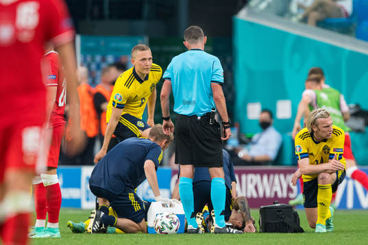 Kristoffer Olsson of Sweden in pain