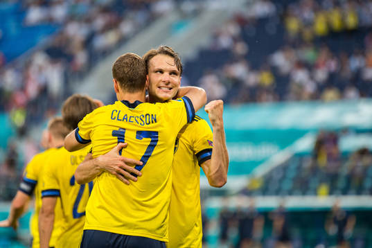 Viktor Claesson and Albin Ekdal celebrate