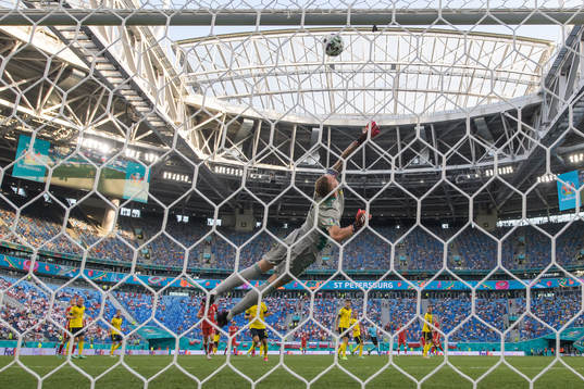 Goalkeeper Robin Olsen of Sweden makes a save