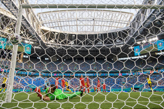 Goalkeeper Wojciech Szczesny of Poland lets in the 2-0 goal