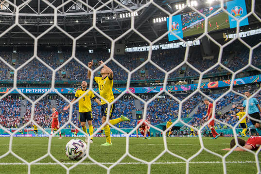 Marcus Berg and Viktor Claesson of Sweden celebrate the 3-2