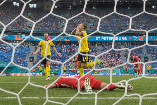 Marcus Berg and Viktor Claesson of Sweden celebrate the 3-2