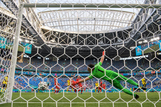Goalkeeper Wojciech Szczesny of Poland lets in the 2-0 goal