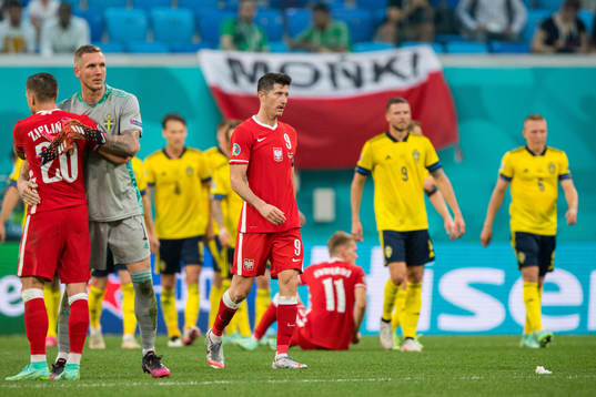 Robert Lewandowski of Poland looks dejected