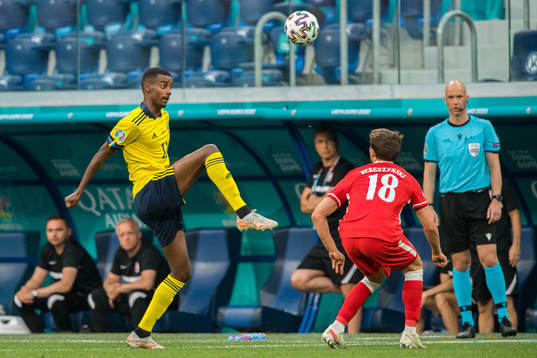 Alexander Isak and Bartosz Bereszynski of Poland