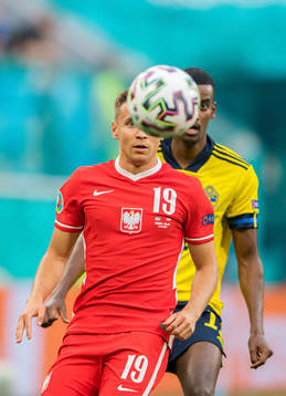 Przemyslaw Frankowski of Poland and Alexander Isak of Sweden