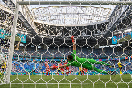Goalkeeper Wojciech Szczesny of Poland lets in the 2-0 goal