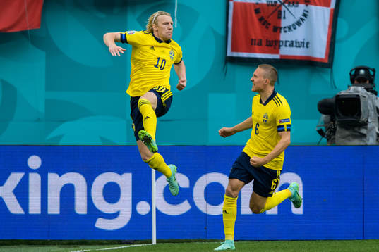 Emil Forsberg and Ludwig Augustinsson of Sweden celebrate