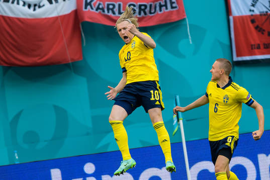Emil Forsberg and Ludwig Augustinsson of Sweden celebrate