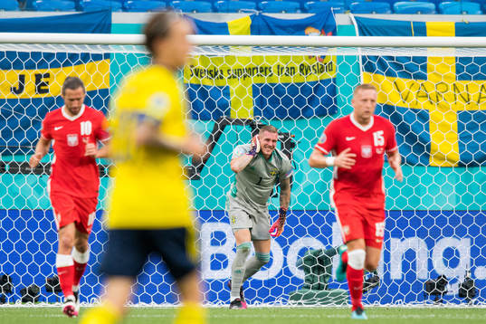 Goalkeeper Robin Olsen of Sweden in pain