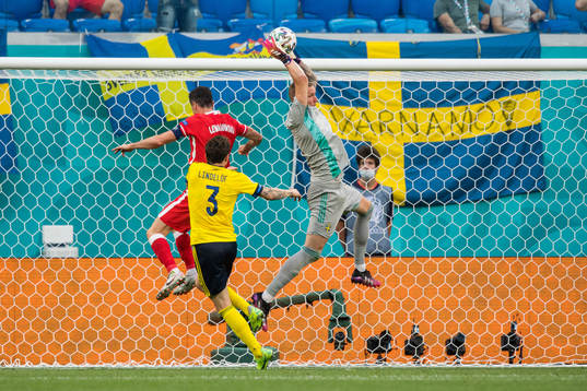 Goalkeeper Robin Olsen of Sweden saves against Robert