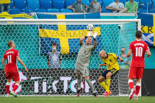 Goalkeeper Robin Olsen and Marcus Danielson of Sweden