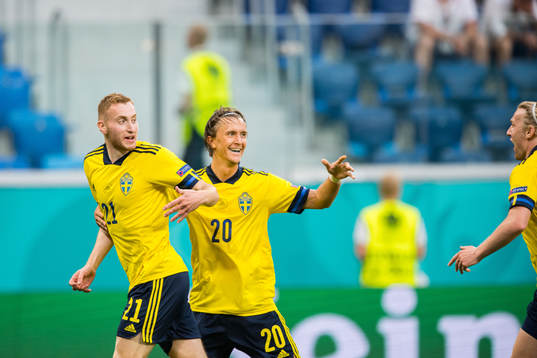 Dejan Kulusevski and Kristoffer Olsson of Sweden celebrate