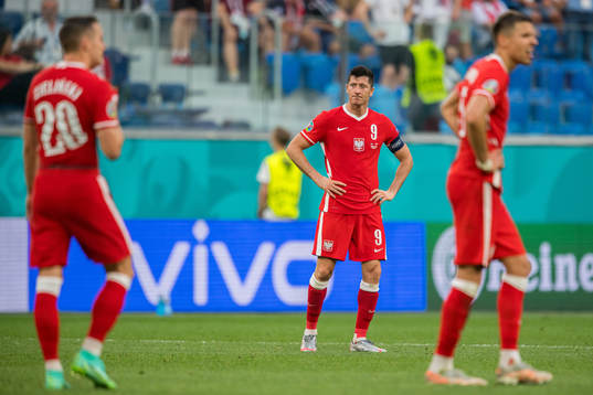 Robert Lewandowski of Poland looks dejected