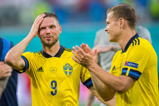 Marcus Berg and Viktor Claesson of Sweden celebrate