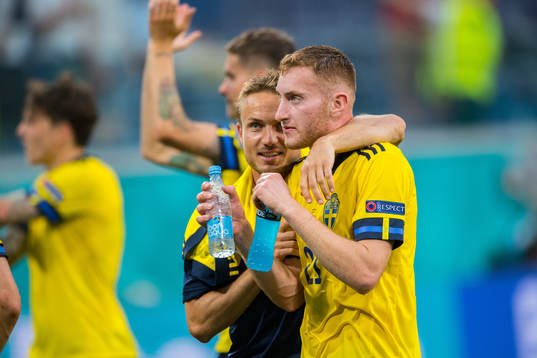 Pierre Bengtsson and Dejan Kulusevski of Sweden celebrate