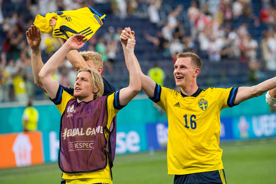 Emil Forsberg and Emil Krafth of Sweden celebrate