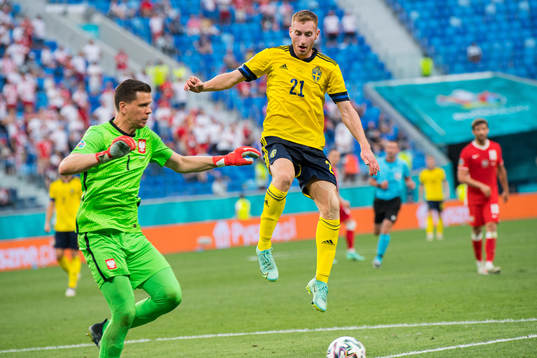 Goalkeeper Wojciech Szczesny of Poland and Dejan Kulusevski