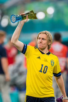Emil Forsberg of Sweden with the trophy for player of the