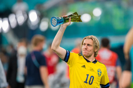 Emil Forsberg of Sweden with the trophy for player of the