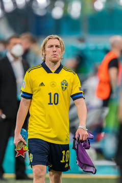 Emil Forsberg of Sweden with the trophy for player of the