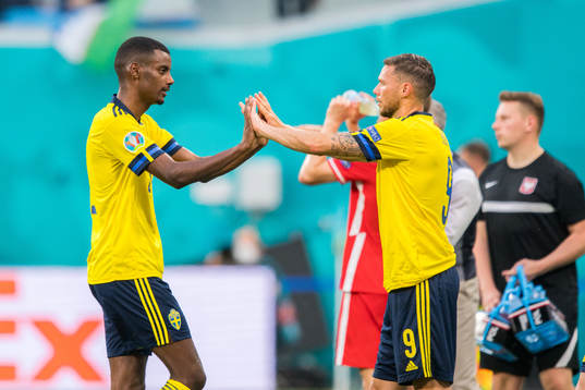 Marcus Berg change with Alexander Isak of Sweden