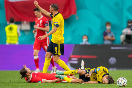 Grzegorz Krychowiak of Poland and Kristoffer Olsson of