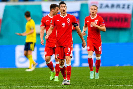 Robert Lewandowski of Poland looks dejected