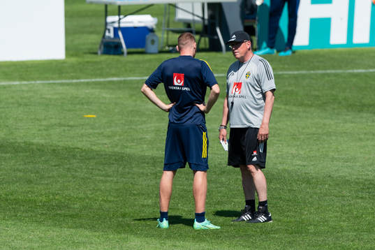 Dejan Kulusevski talks to head coach Janne Andersson of the