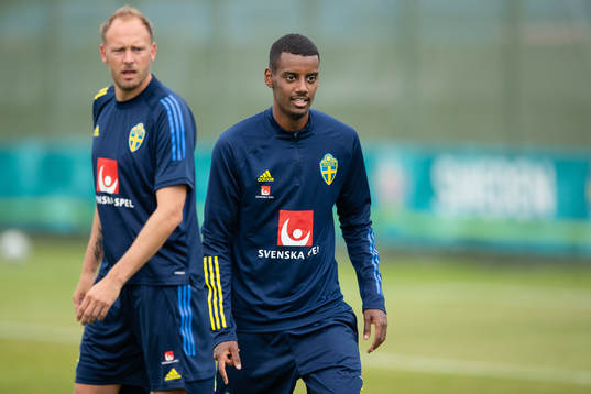 Andreas Granqvist  and Alexander Isak of the Swedish