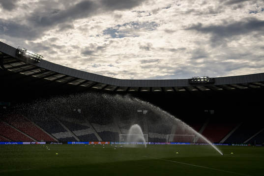 Sprinklers watering the pitch