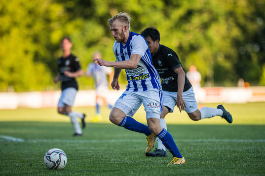 Karlshamns Lukas Jönsson  och Sölvesborgs James Natthawit