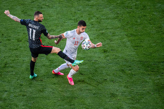 Marcelo Brozovic of Croatia and Ferran Torres of Spain