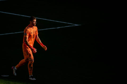Goalkeeper Unai Simon of Spain looks dejected
