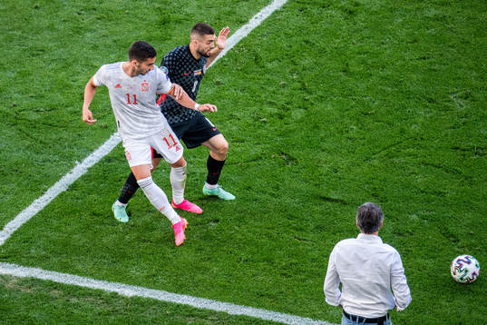 Ferran Torres of Spain and Mateo Kovacic of Croatia