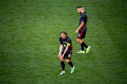 Luka Modric and Nikola Vlasic of Croatia looks dejected