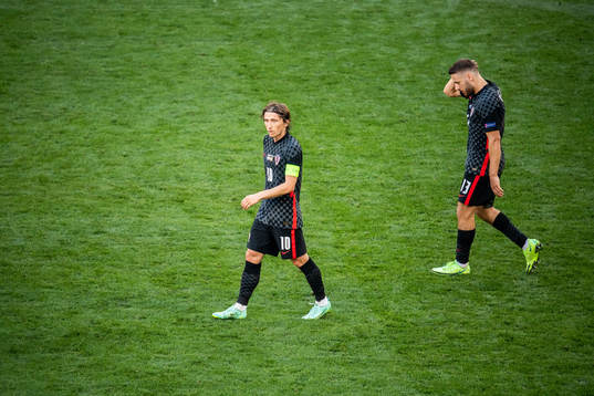 Luka Modric and Nikola Vlasic of Croatia looks dejected