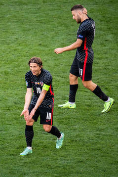 Luka Modric and Nikola Vlasic of Croatia looks dejected