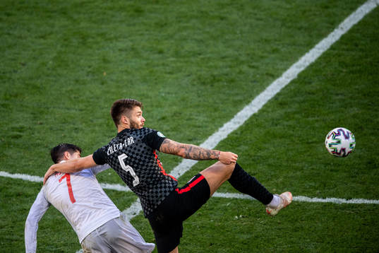 Alvaro Morata of Spain and Duje Caleta-Car of Croatia