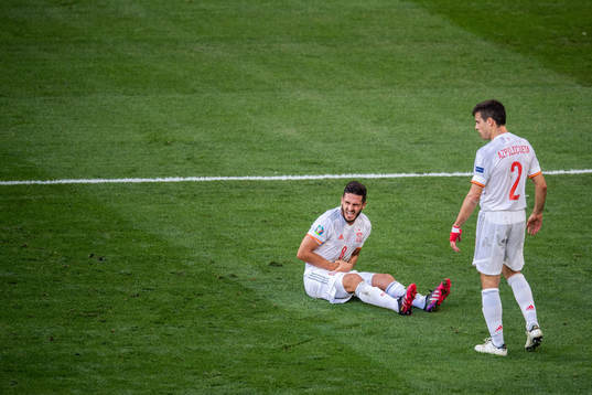 Koke Koke of Spain in pain