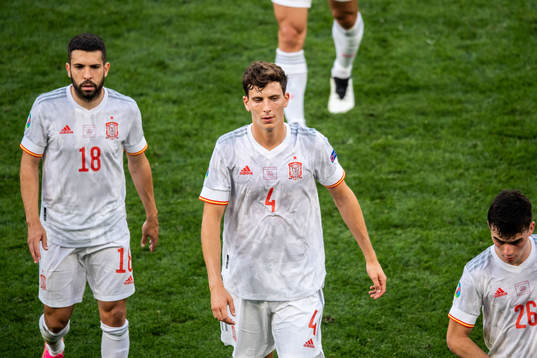 Jordi Alba and Pau Torres of Spain looks dejected